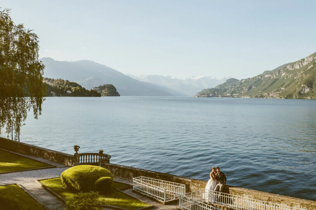 Wide view of Lake Como with a couple of newlyweds taken from Villa Aura del Lago.